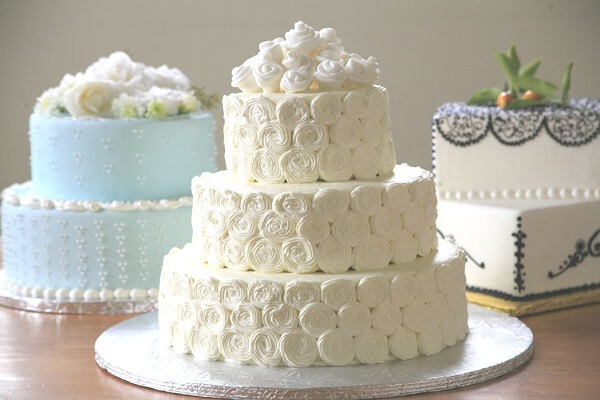 three costco cakes with floral design