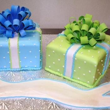 a blue and green gift designed cakes