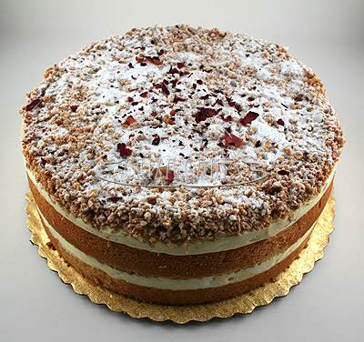 Crixa Cakes' Amaretti Cream Cake on top of gold plate