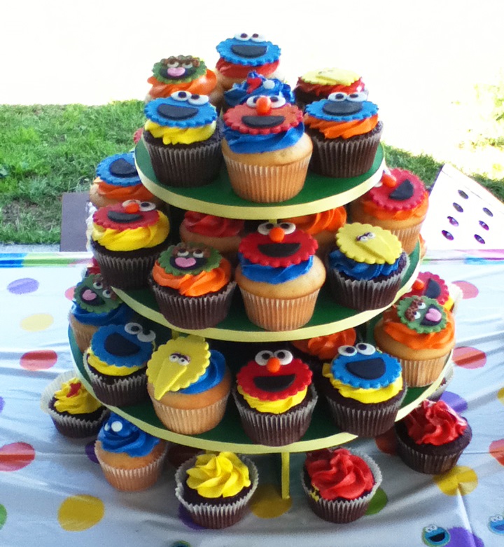 Cupcake stand with decorated Sesame Street cupcakes
