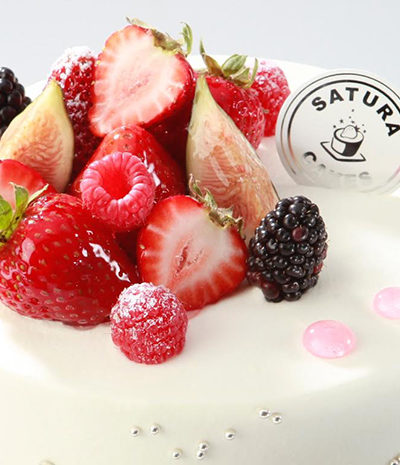 White Satura Cake with berries on top